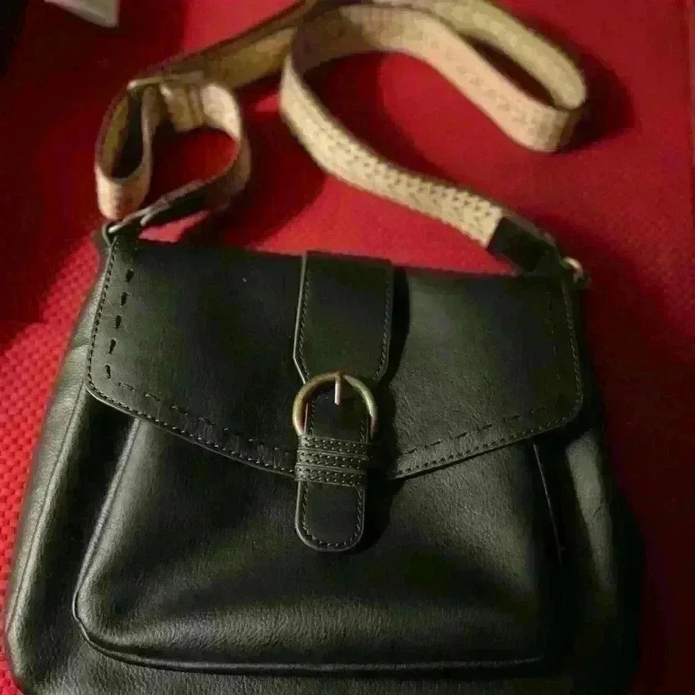 Ladies shoulder strap black ANA purse, pocket in the front